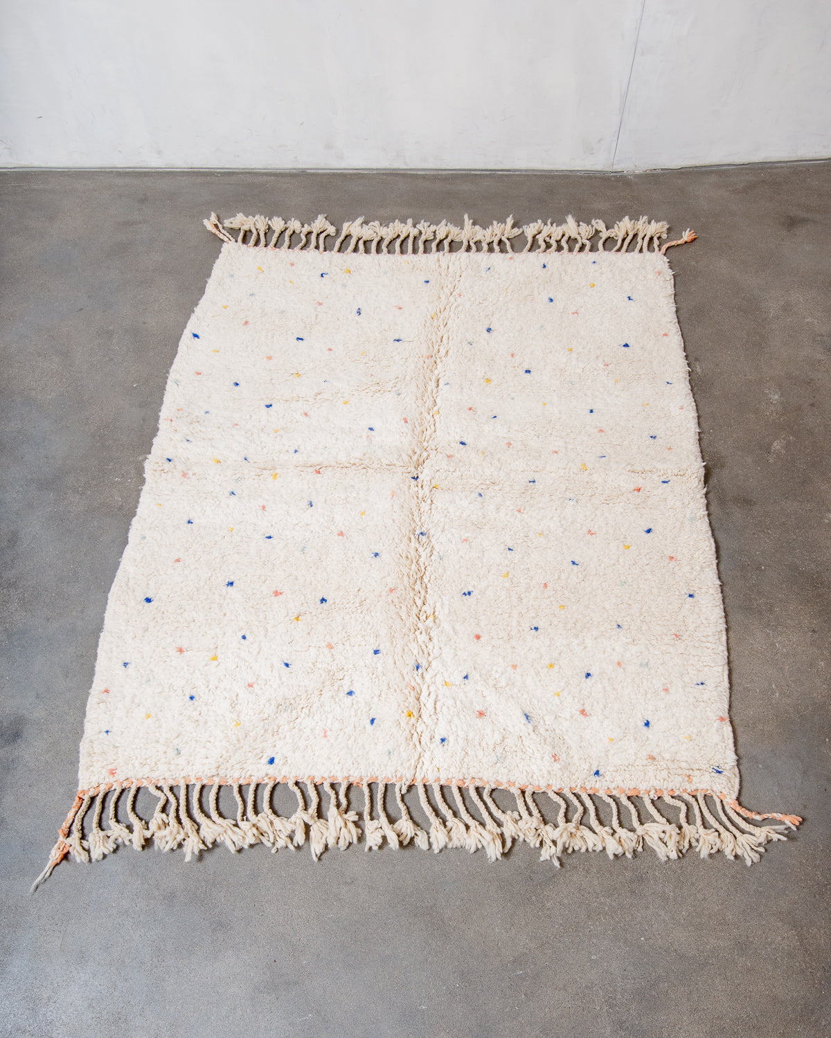 Modern, designer, handcrafted Berber rug from Morocco. Beniourain carpet with beautiful colours and patterns and fluffy wool texture.